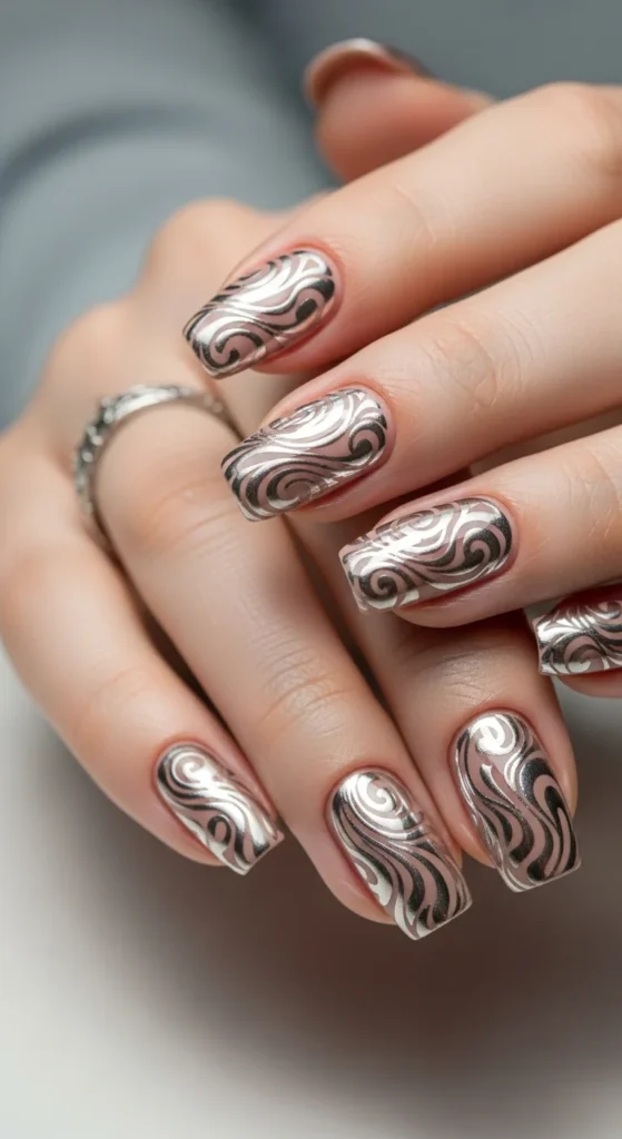 16. Nude Chrome Swirl Nails.webp