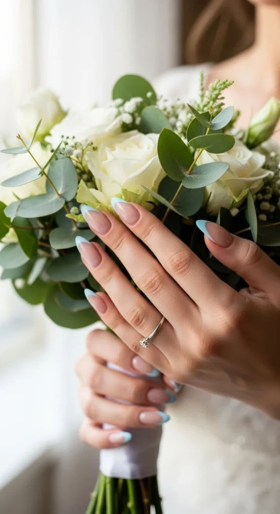 23. Soft Blue French Bridal Nails.webp