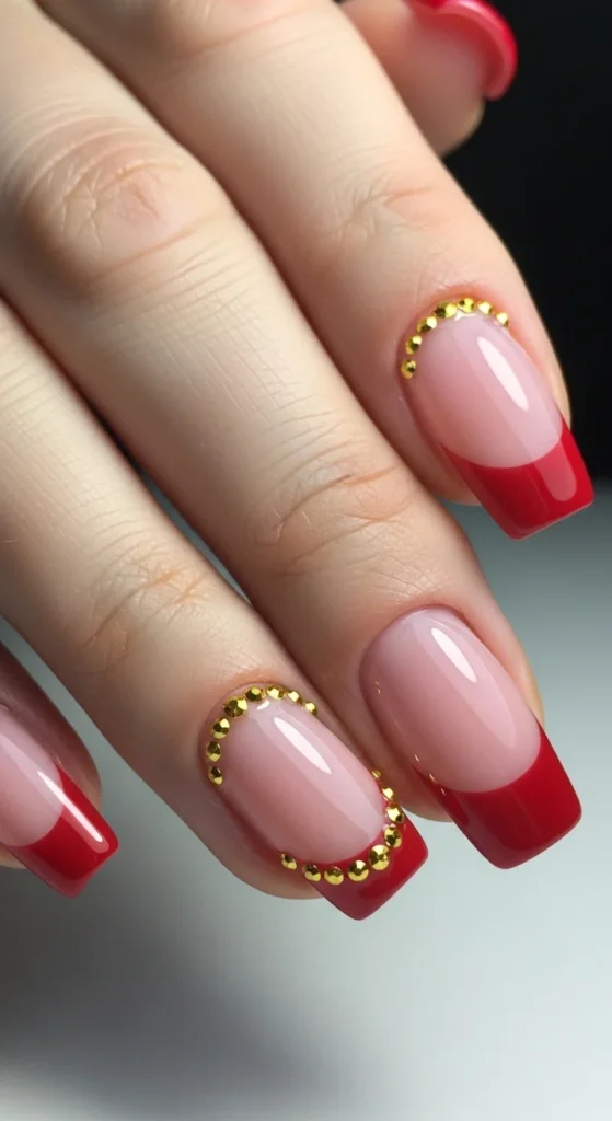 19. Red French Tips with Gold Crystals.webp
