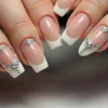 24 Dazzling French Nails with Gems That Look Like Jewelry.webp