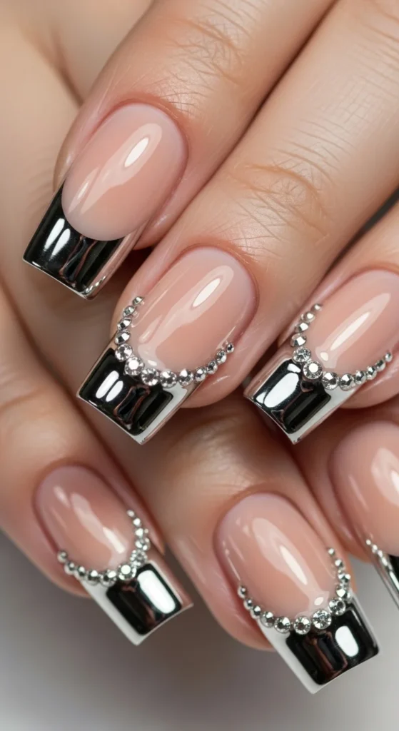 7. Chrome French with Gem Accents.webp