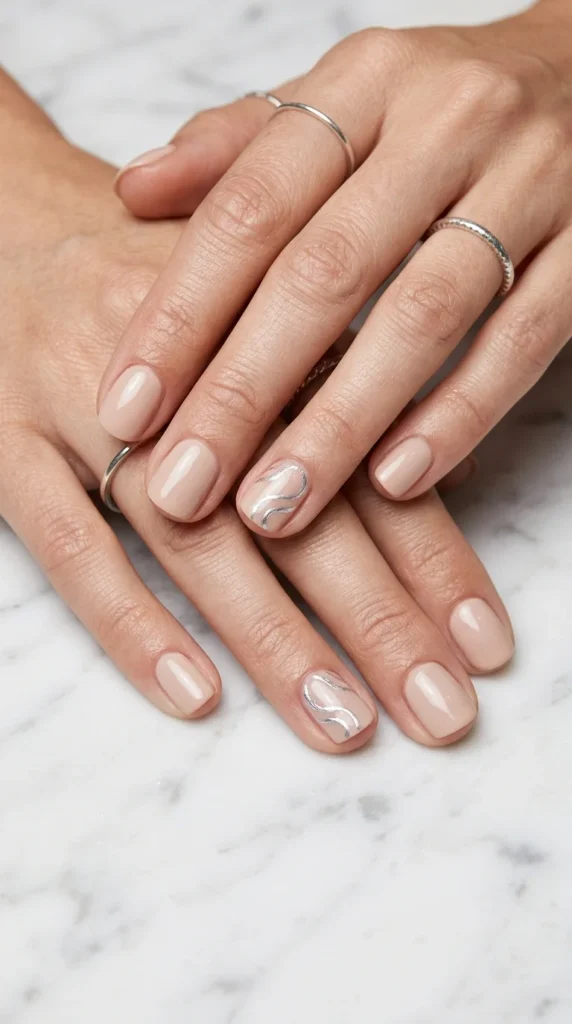 18. Minimal Silver Swirl Nails.webp