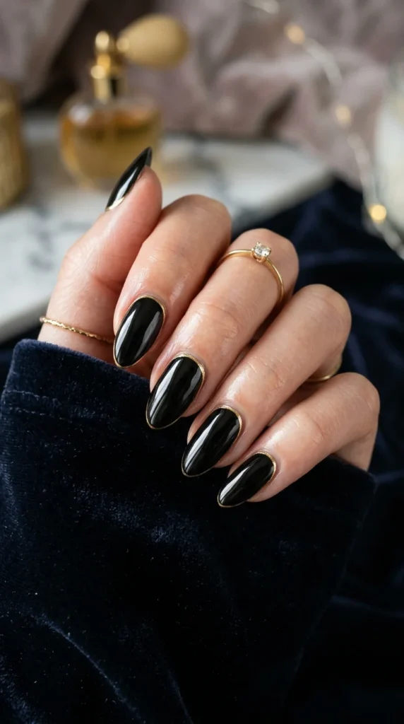 22. Black Nails with Gold Cuticle Outline.webp