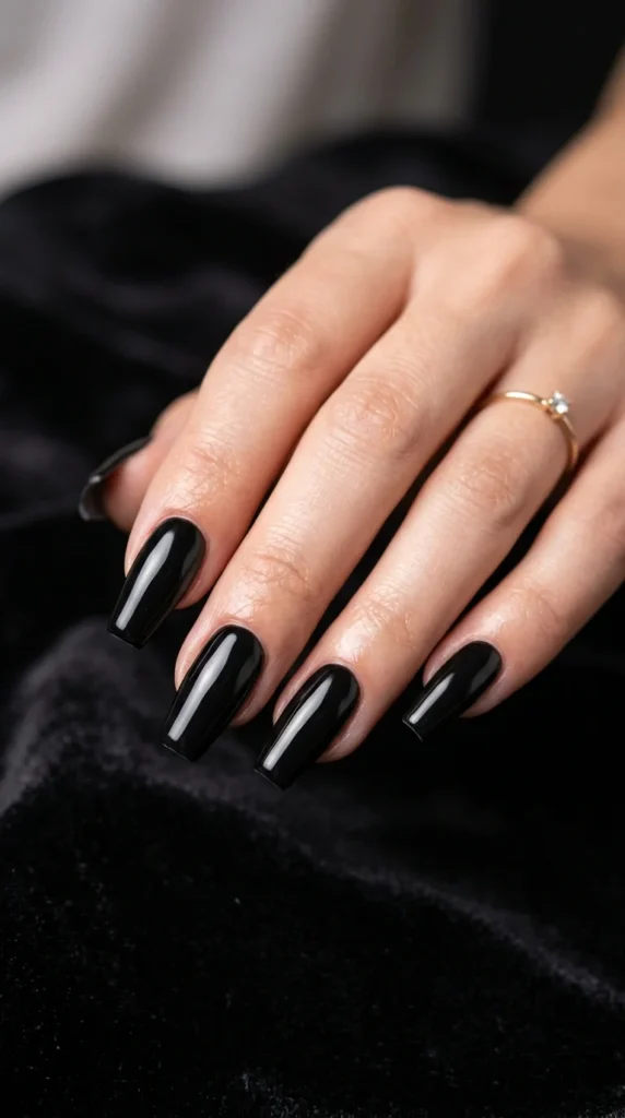 24. Black Coffin Nails with Minimal Gloss Finish.webp