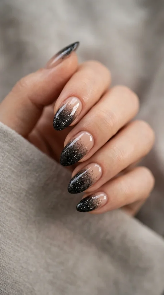 1. Black Glitter Gradient Nails.webp