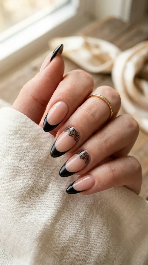 13. Black French Tips with Delicate Lace Art.webp