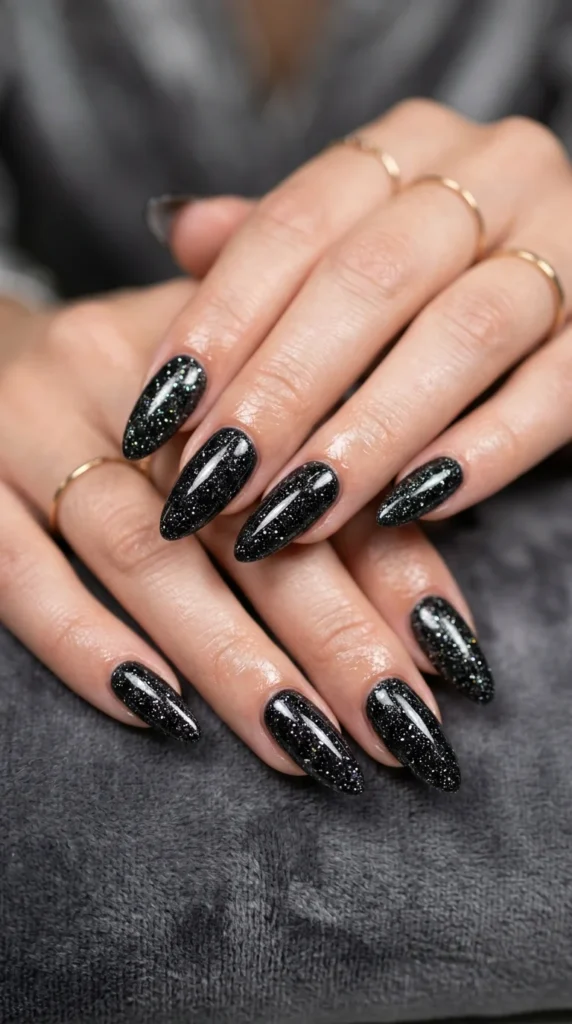 19. Black Glitter Acrylic Nails.webp