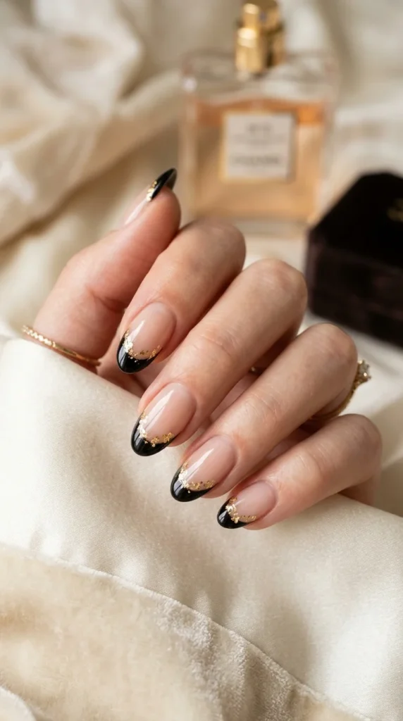 22. Black French Tips with Subtle Gold Foil.webp