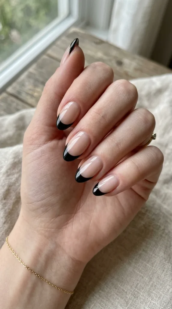 23. Minimal Gloss Black French Tips.webp