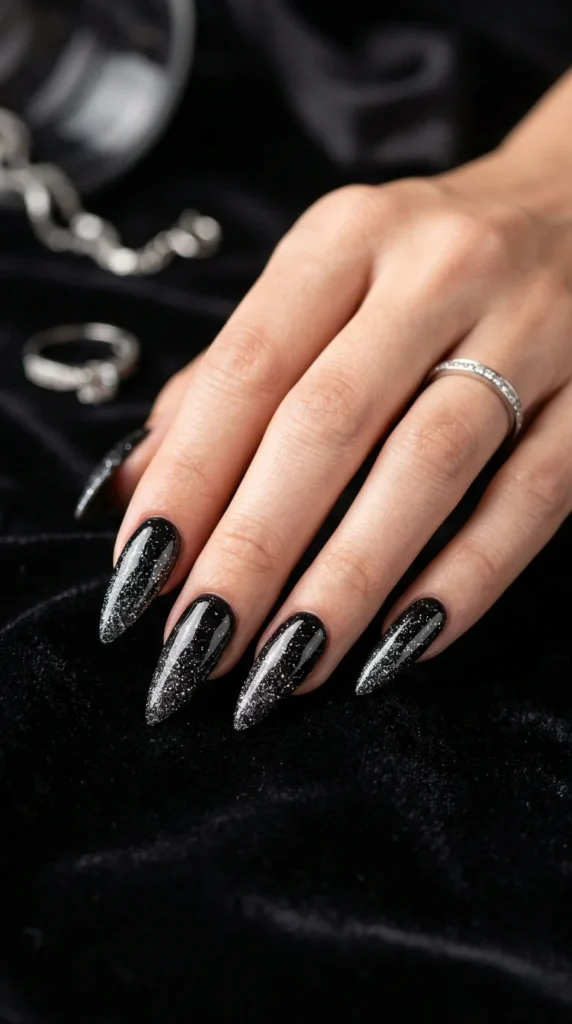 6. Stiletto Nails with Fine Silver Glitter.webp