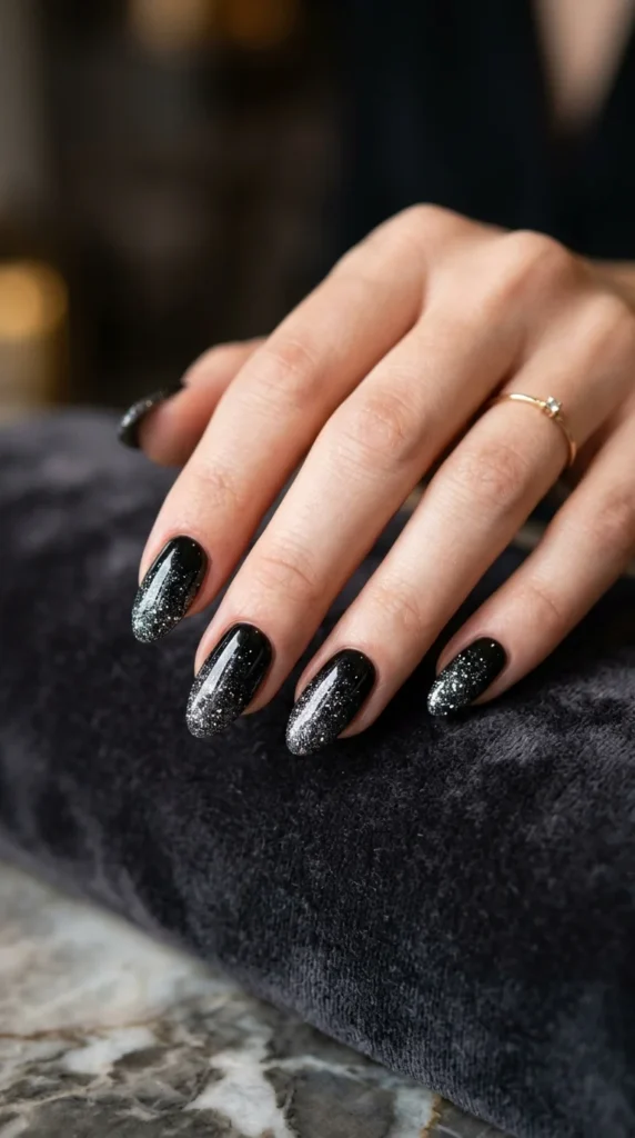 9. Black Glitter Ombré Nails.webp
