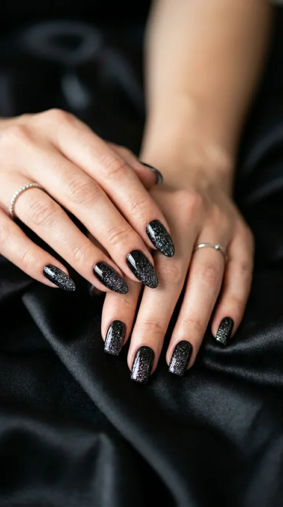 black nails with glitter.webp
